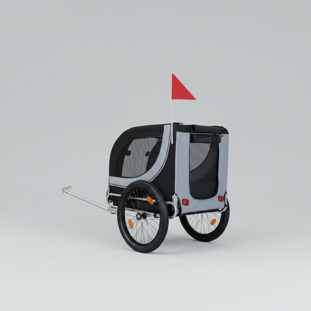Person cycling with a pet bike trailer on a road, featuring a dog inside.