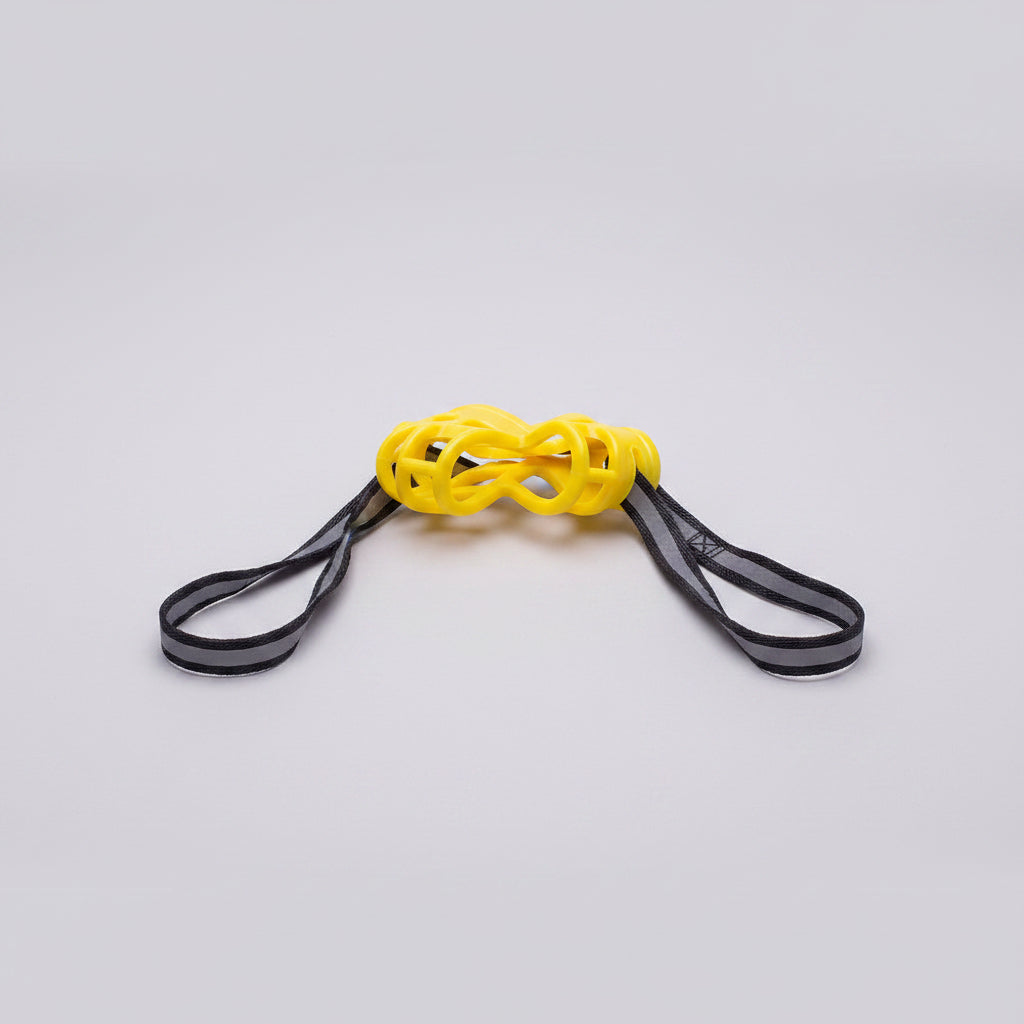 Hand holding a yellow resistance band against a white background