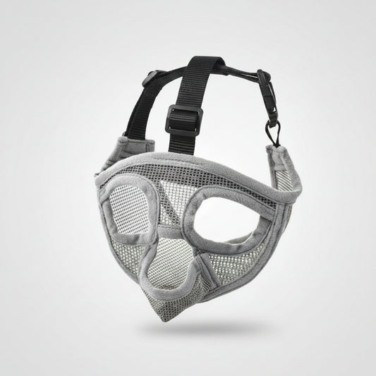 Gray mesh dog muzzle with black straps on a white background