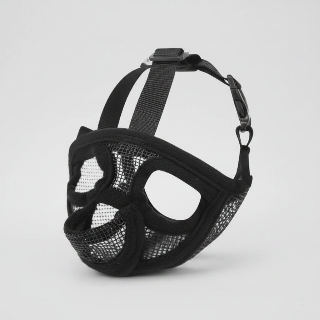 Black dog muzzle with mesh design on a white background