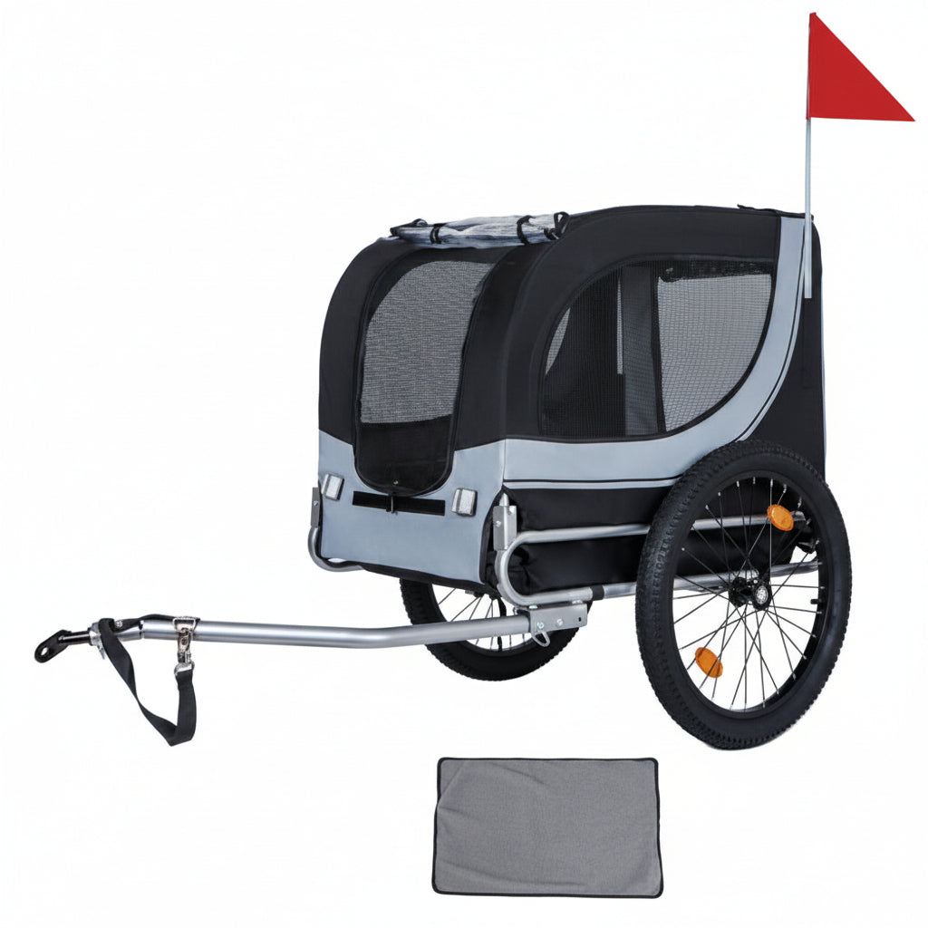 Pet bike trailer with a dog inside on a white background