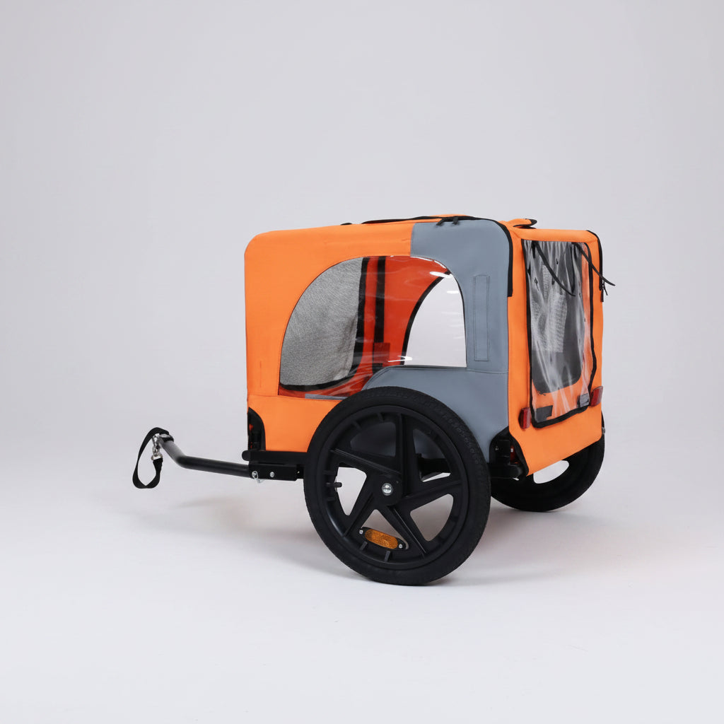 Orange and gray pet bike trailer with wheels on a white background