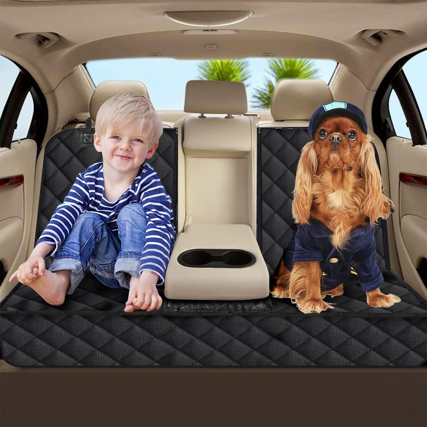 Child and dog sitting on a car seat with a black quilted cover