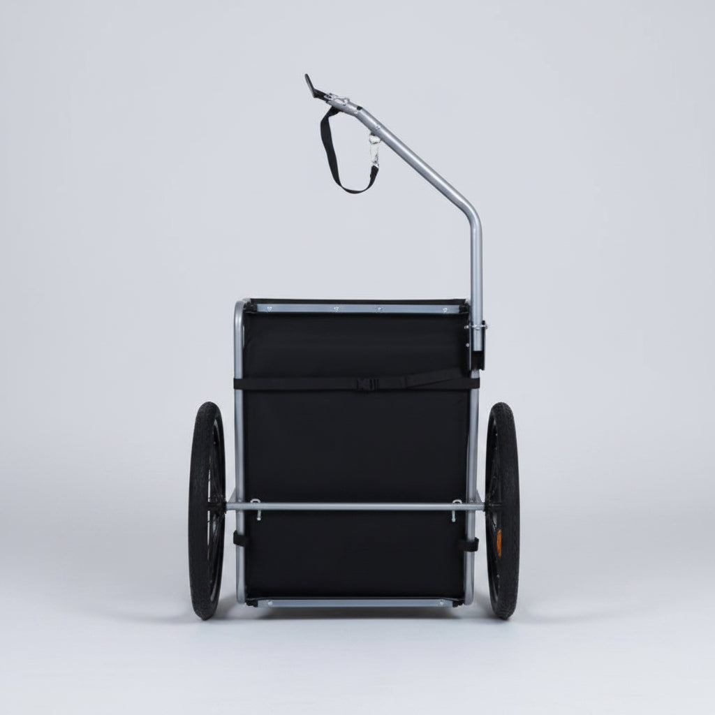 Black wheelbarrow with a handle on a white background